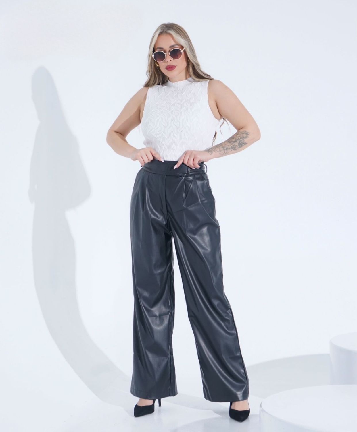 Leather pants with pleats